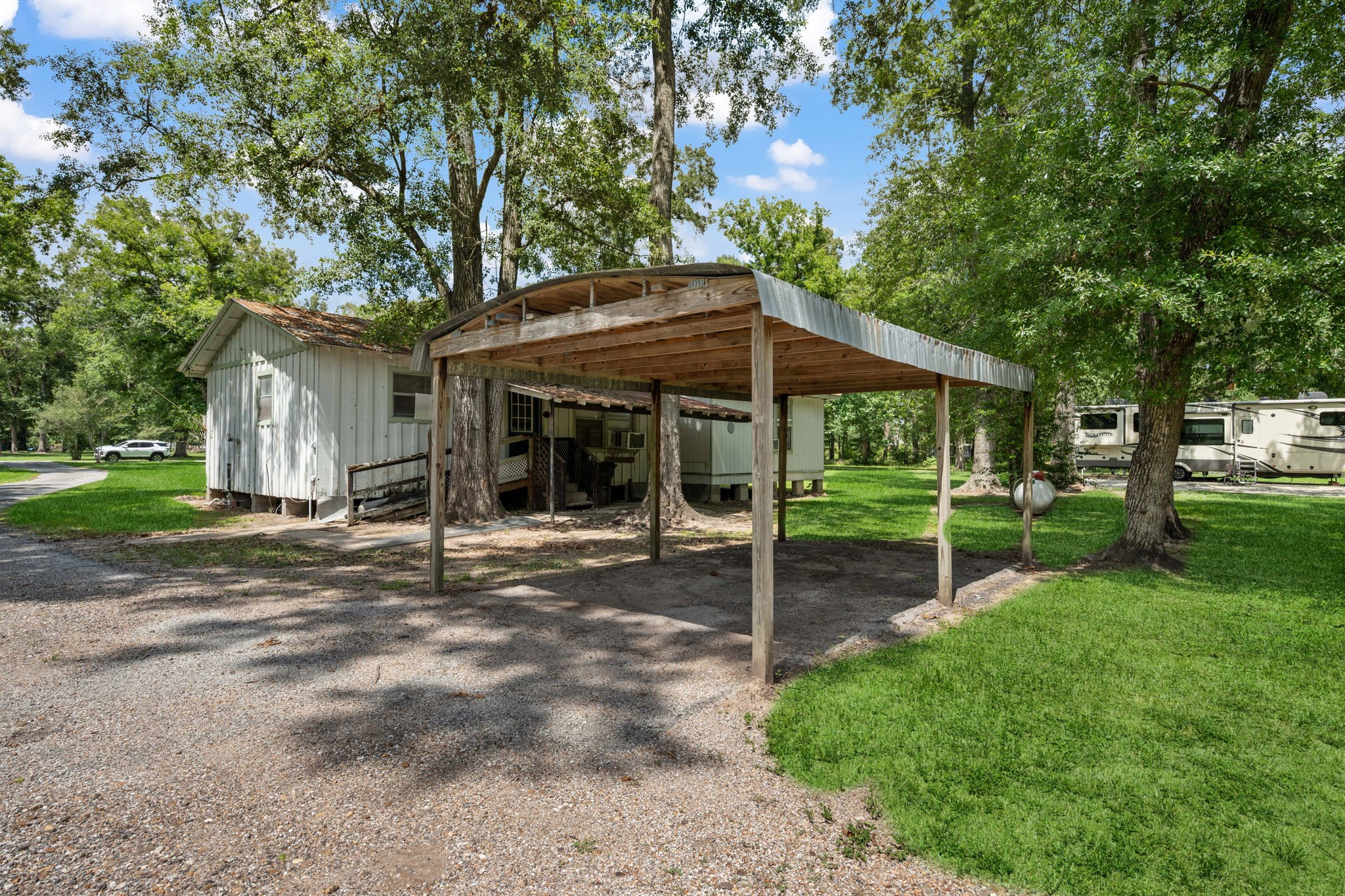 21000 Buck Knoll Road Conroe, TX 77306 - Photo 16 of 20 Carport