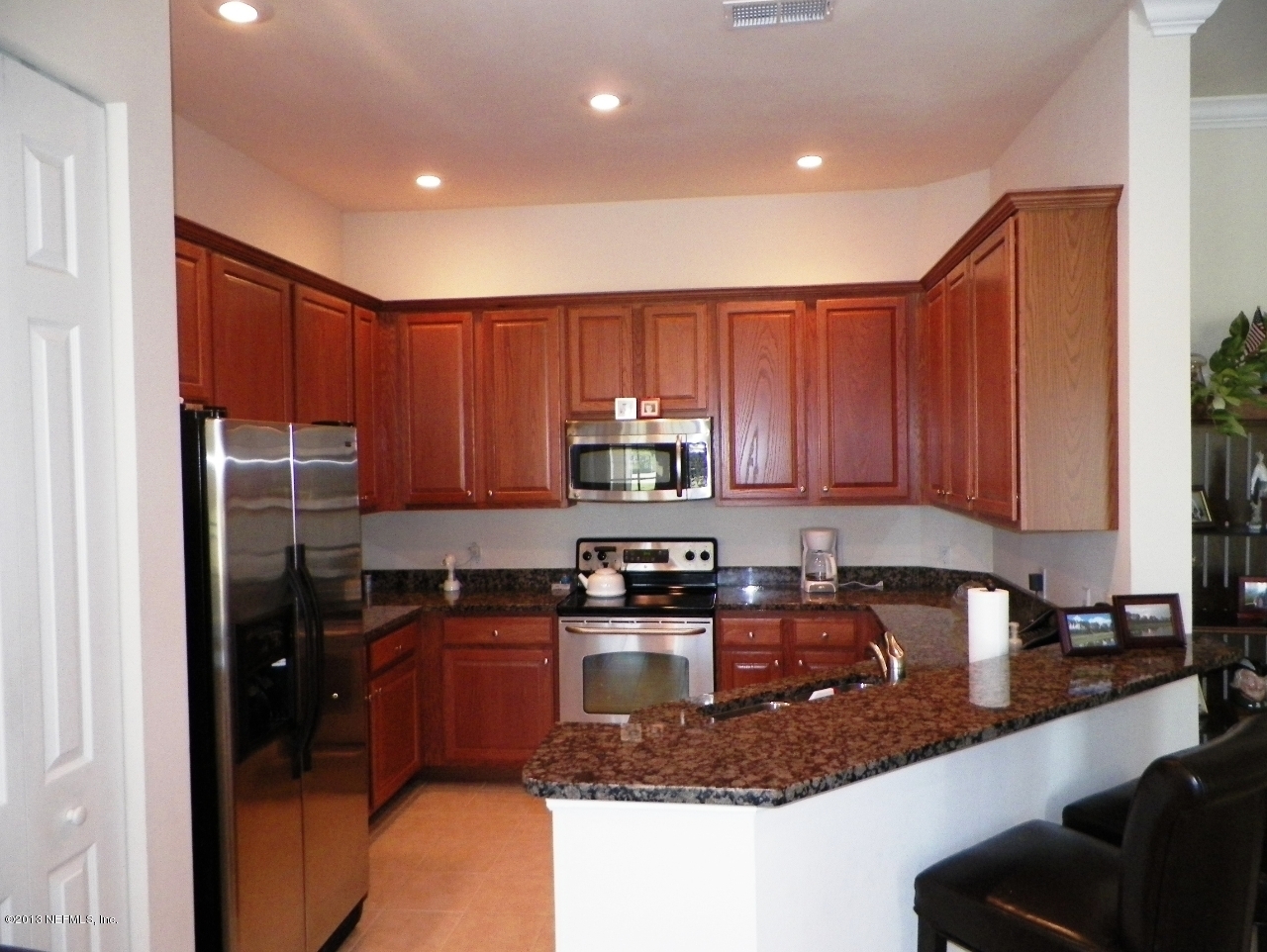 2002 Pond Ridge Court, Unit 1406 Fleming Island, FL 32003 - Photo 5 of 19 Kitchen_from breakfast nook