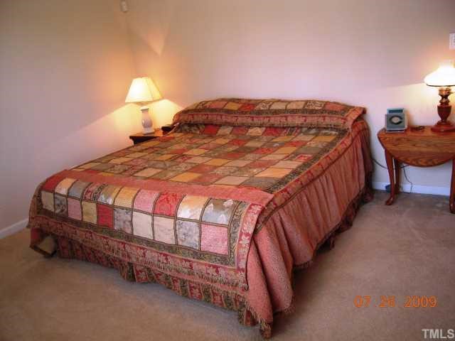 2110 Breezeway Drive, Unit 101 Raleigh, NC 27614 - Photo 6 of 12 Fabulous master bedroom w/large walk in closet.