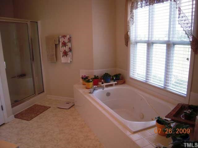 2110 Breezeway Drive, Unit 101 Raleigh, NC 27614 - Photo 8 of 12 Whirlpool & separate shower.