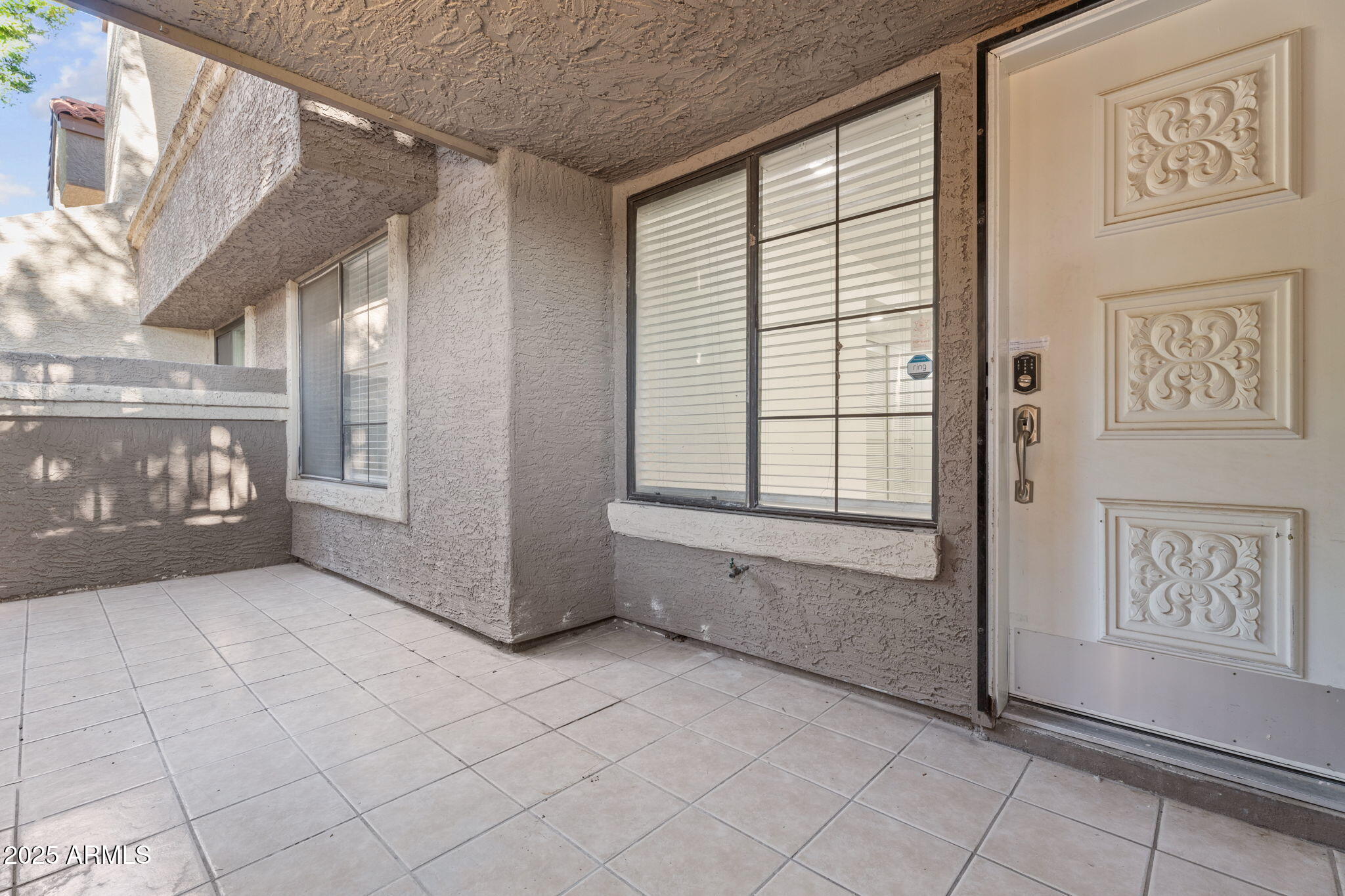 1905 East University Drive, Unit 133 Tempe, AZ 85288 - Photo 9 of 38 a view of an empty room with a window