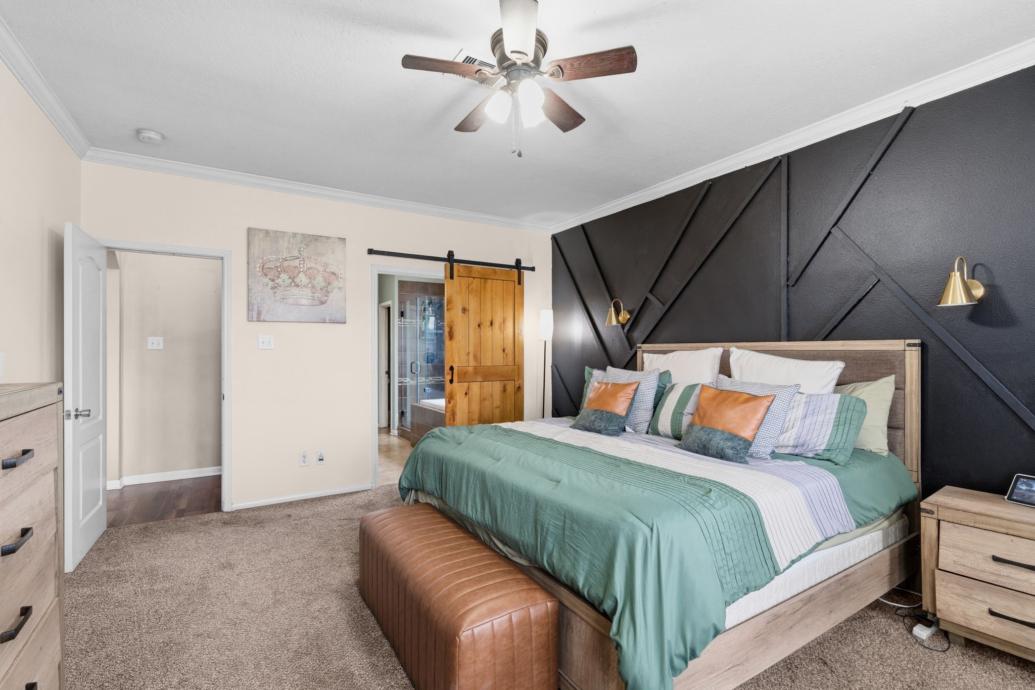 1319 Collier Point Lane Fresno, TX 77545 - Photo 16 of 33 Another view of the primary bedroom showcases the room’s spacious layout, stylish finishes, and calming atmosphere.