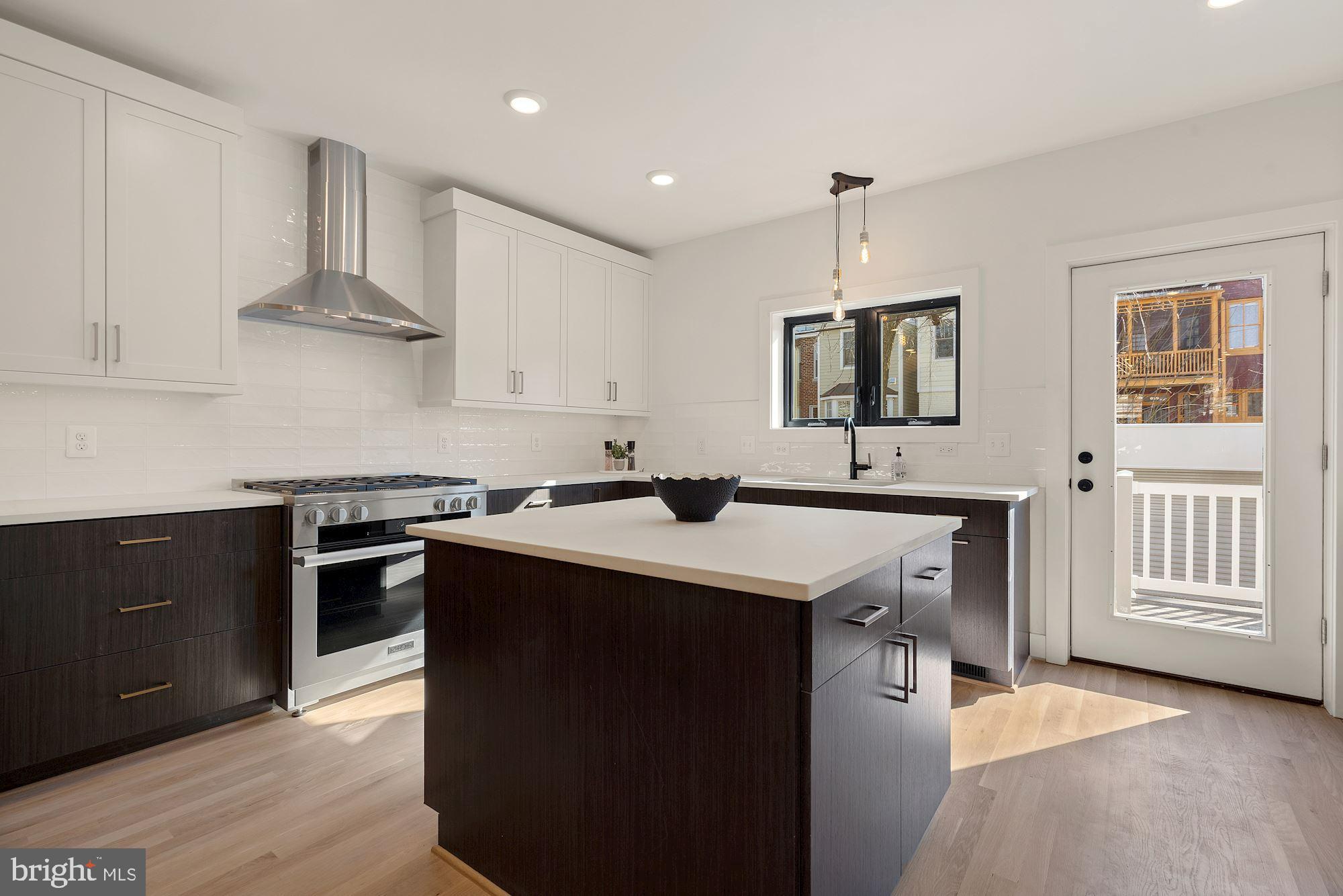 617 Lexington Place Northeast Washington, DC 20002 - Photo 13 of 43 Rear Deck Access off the Kitchen