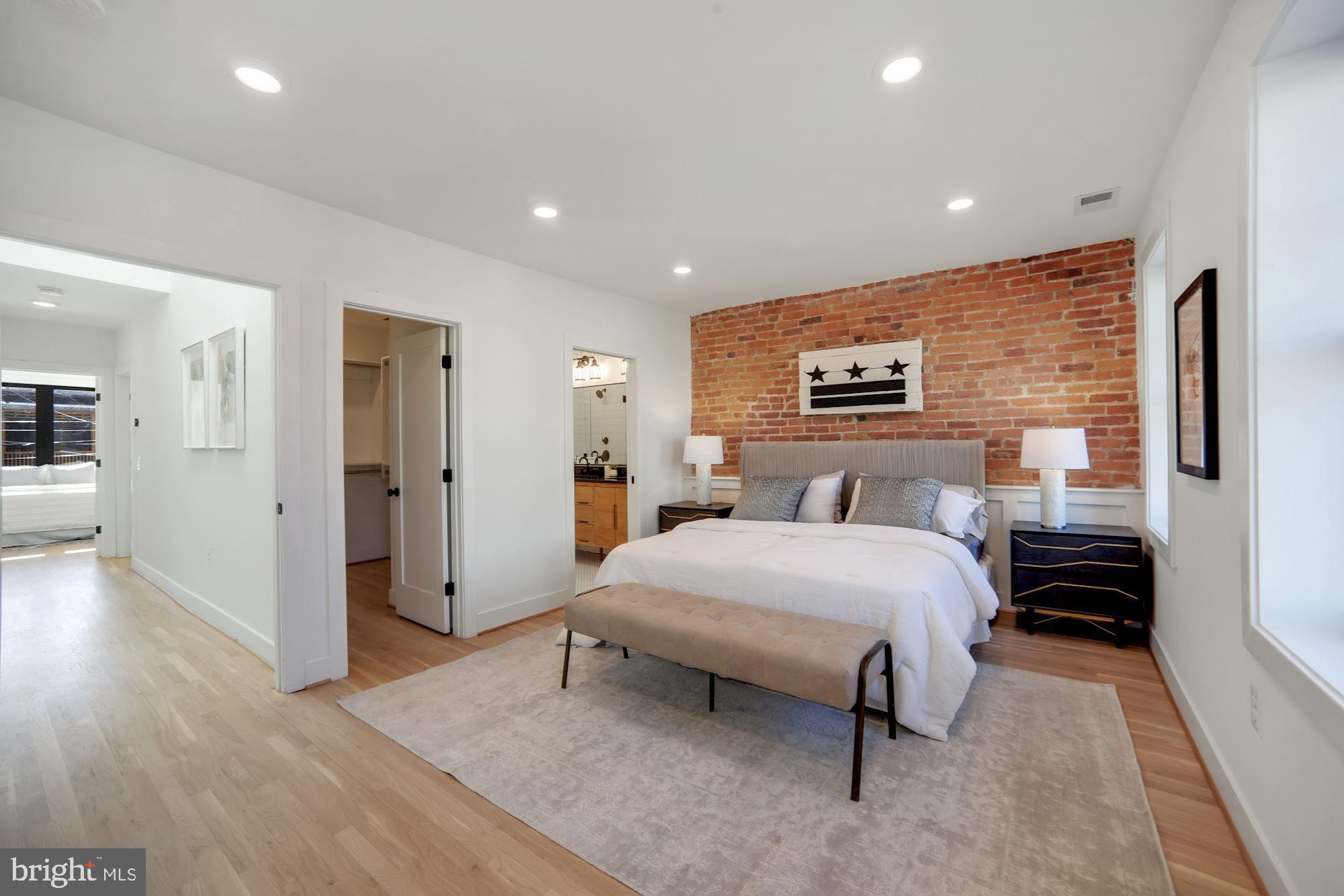 617 Lexington Place Northeast Washington, DC 20002 - Photo 30 of 43 Spacious Primary Suite w/exposed Brick