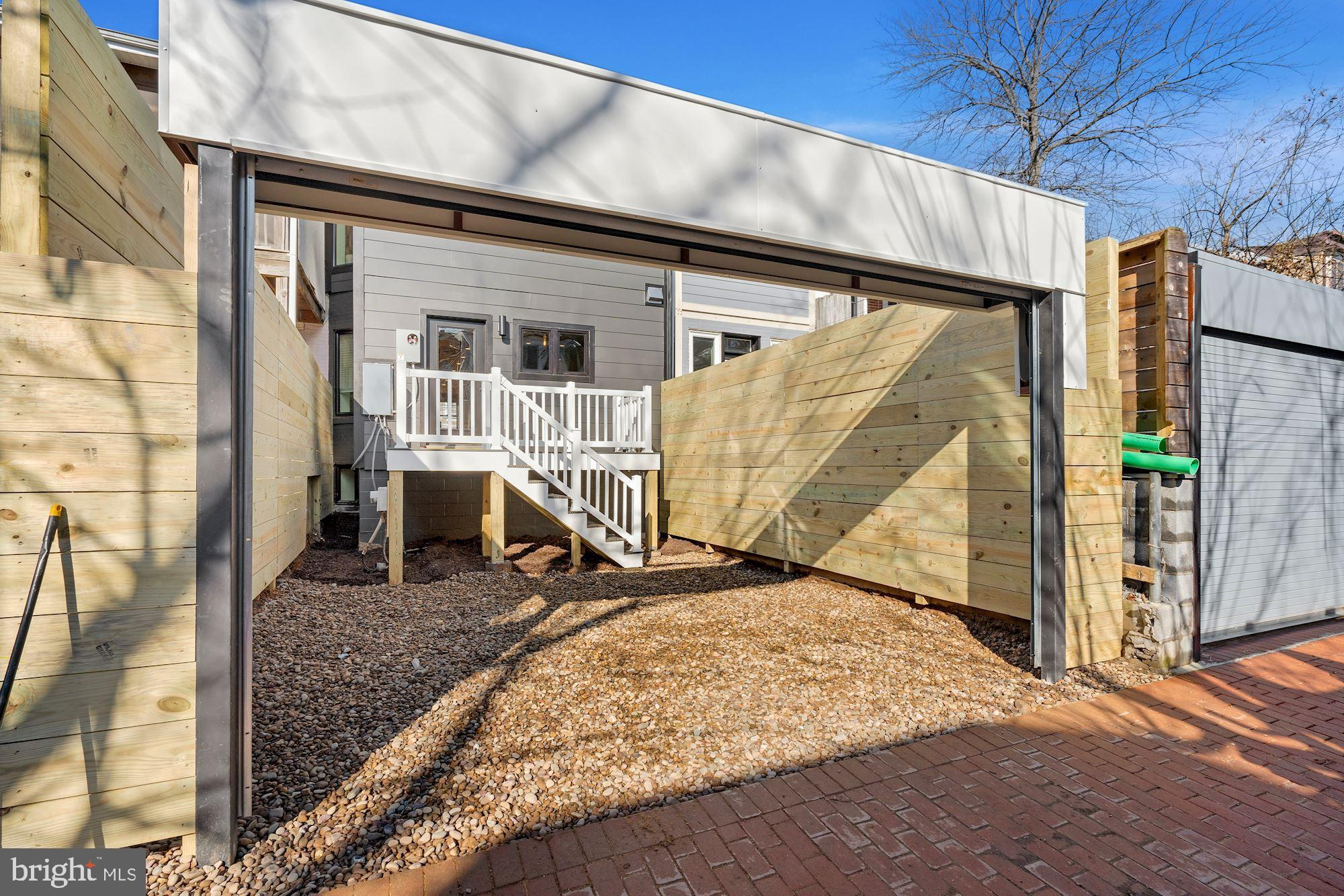 617 Lexington Place Northeast Washington, DC 20002 - Photo 42 of 43 Roll Up Garage Door (patio to be added)