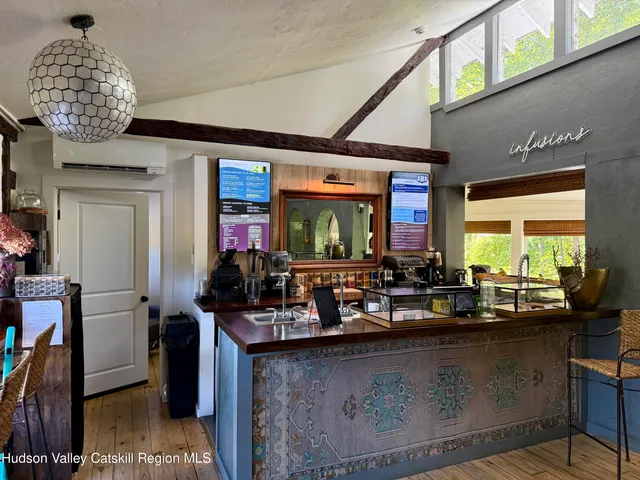 a kitchen with a sink a counter top space and a window