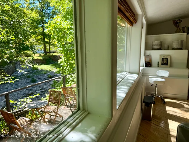 a view of balcony and wooden floor