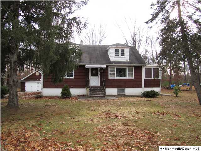 65 Thompson Bridge Road Jackson, NJ 08527 - Photo 1 of 3 a house that has a tree in front of it