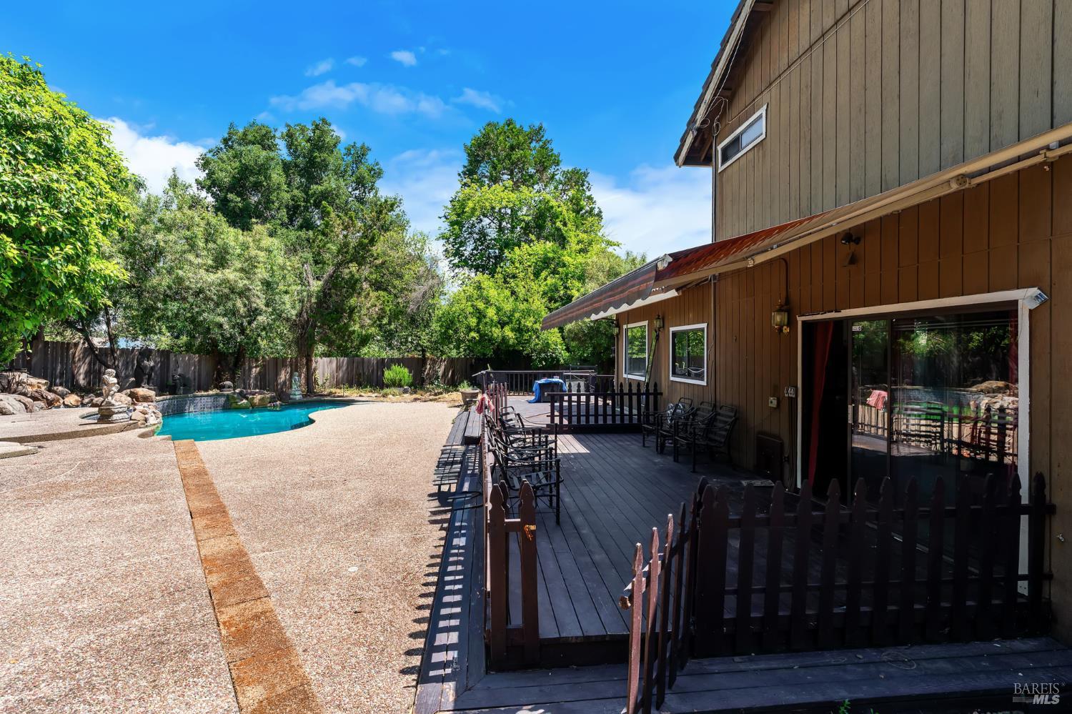 715 Placer Court Santa Rosa, CA 95401 - Photo 24 of 37 a view of a house with backyard and sitting area