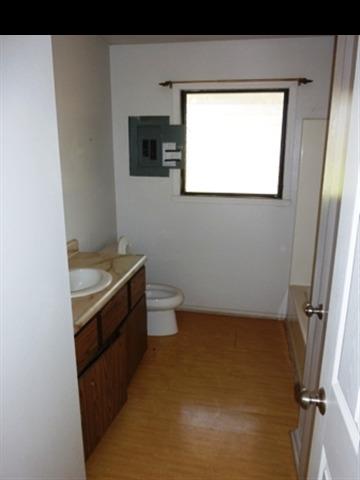 2715 Lower Kula Road Kula, HI 96790 - Photo 15 of 19 a bathroom with a sink toilet and mirror