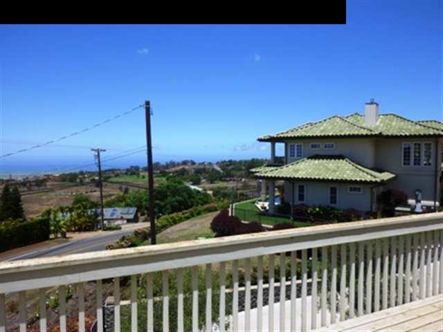 2715 Lower Kula Road Kula, HI 96790 - Photo 18 of 19 a view of a street with a lounge chairs