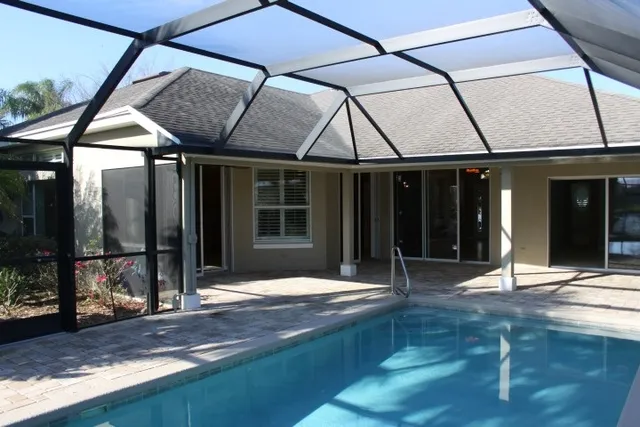 a view of entrance gate of the house and window