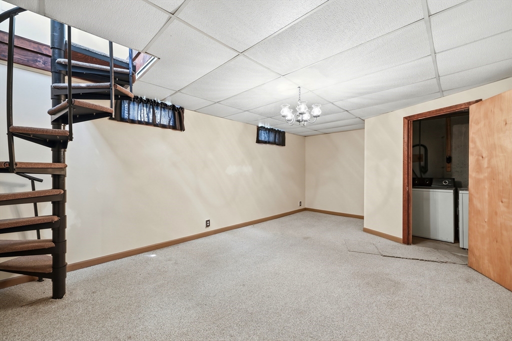 19-21 Wedgewood Circle Springfield, MA 01129 - Photo 28 of 32 a view of a hallway with stairs