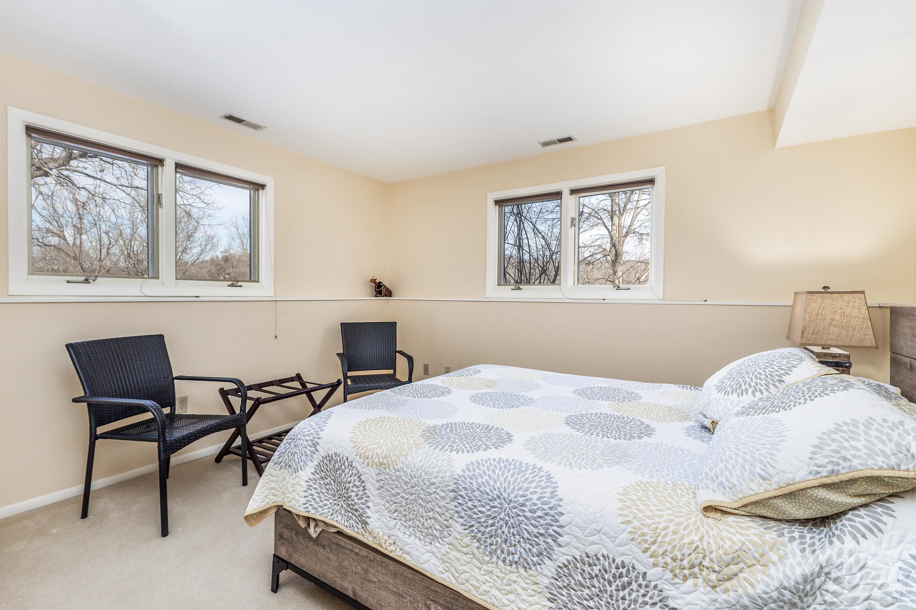 4 Timberline Drive Galena, IL 61036 - Photo 15 of 32 a bedroom with a bed and a table