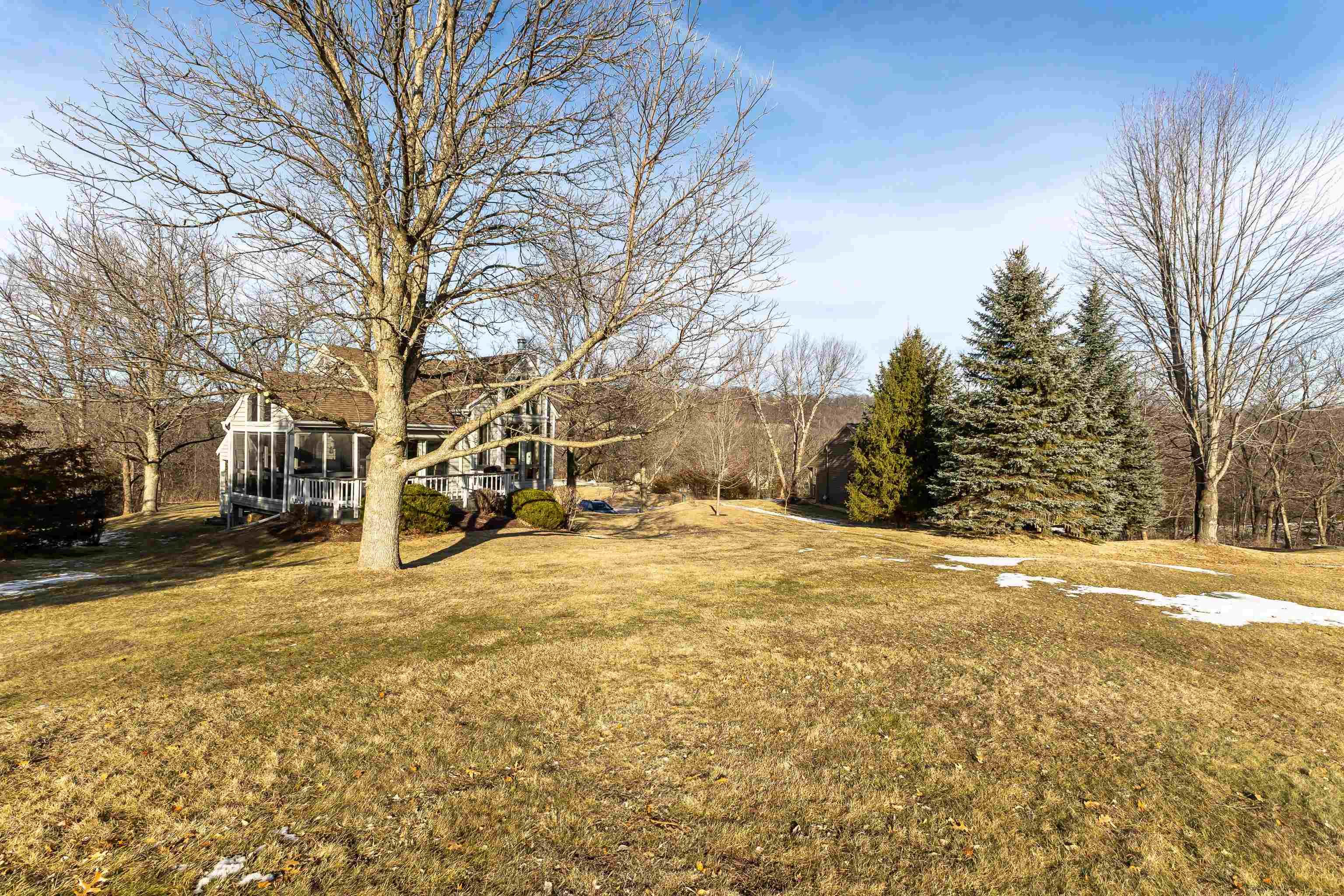 4 Timberline Drive Galena, IL 61036 - Photo 19 of 32 a view of a yard with snow on the road
