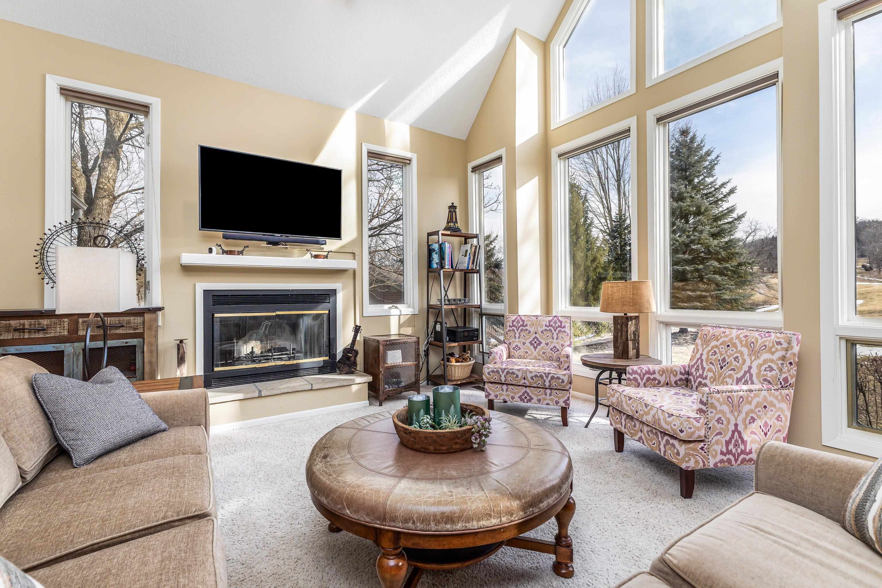 4 Timberline Drive Galena, IL 61036 - Photo 26 of 32 a living room with furniture fireplace and flat screen tv