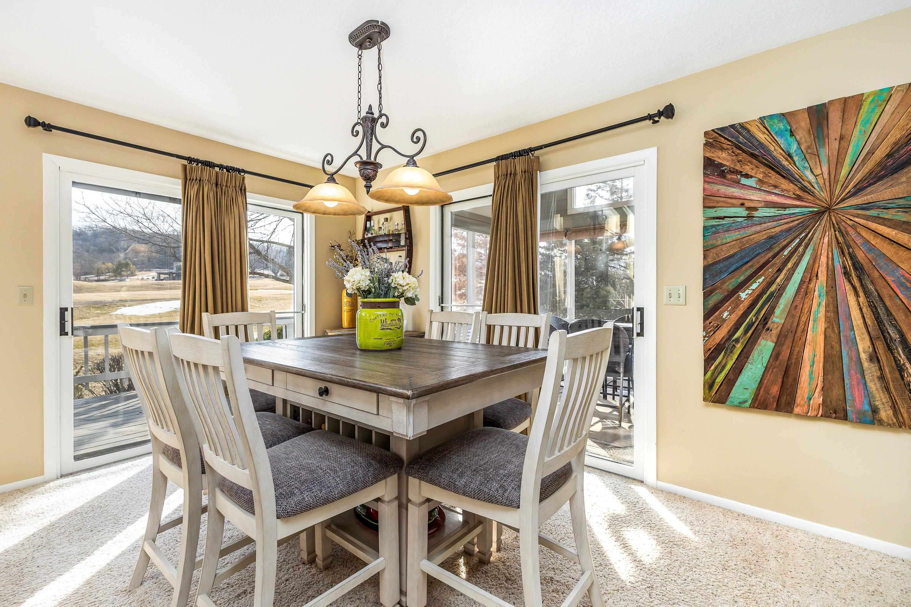 4 Timberline Drive Galena, IL 61036 - Photo 29 of 32 a view of a dining room with furniture window and outside view