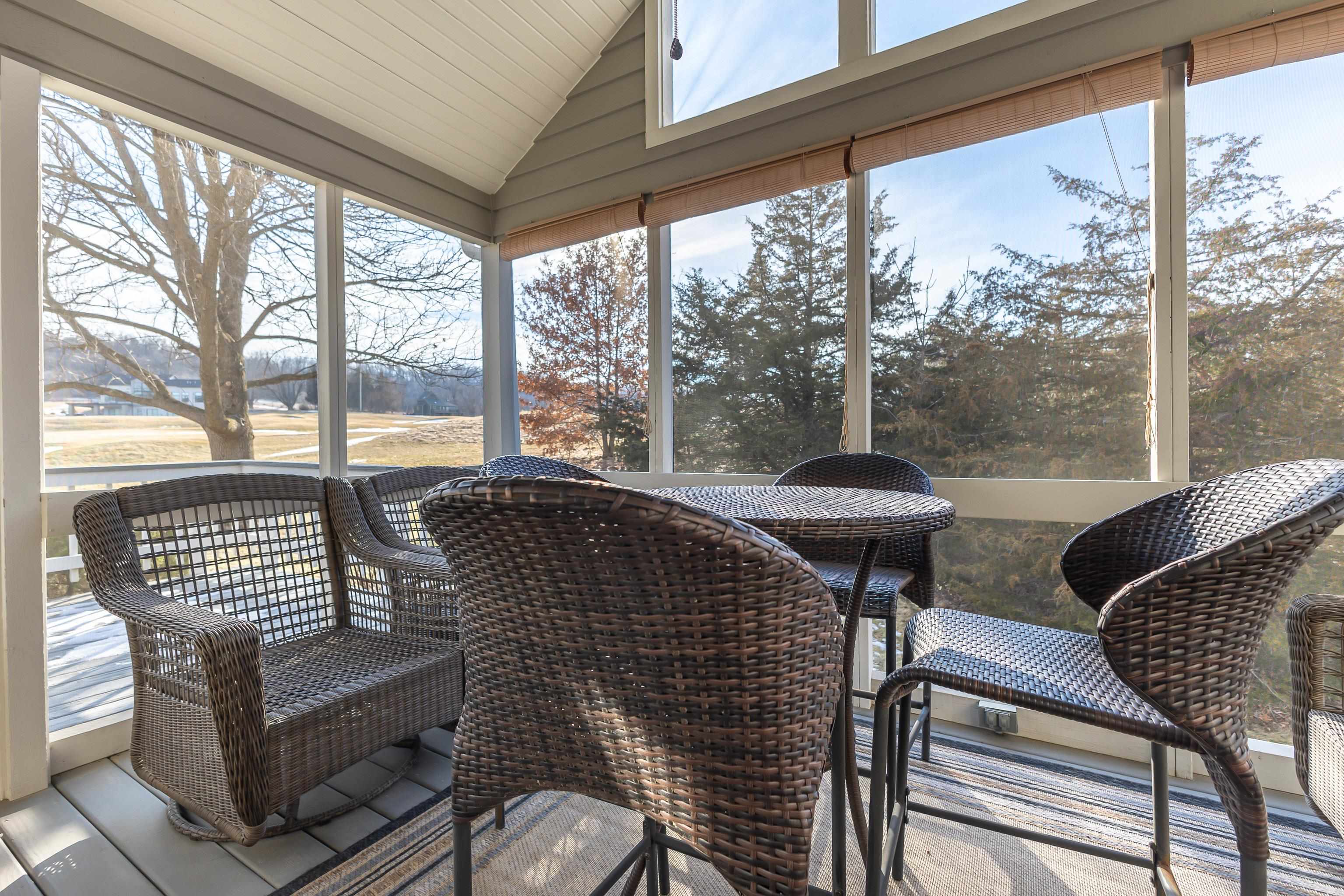 4 Timberline Drive Galena, IL 61036 - Photo 3 of 32 a view of a chairs and table in the patio