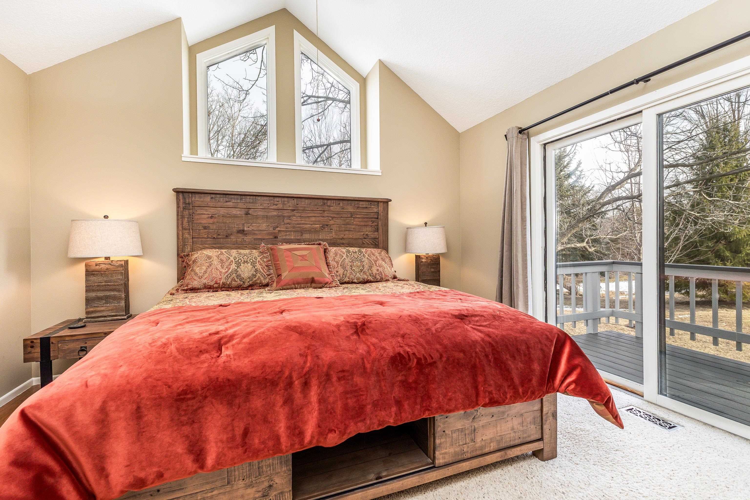 4 Timberline Drive Galena, IL 61036 - Photo 6 of 32 a bedroom with a bed and a window