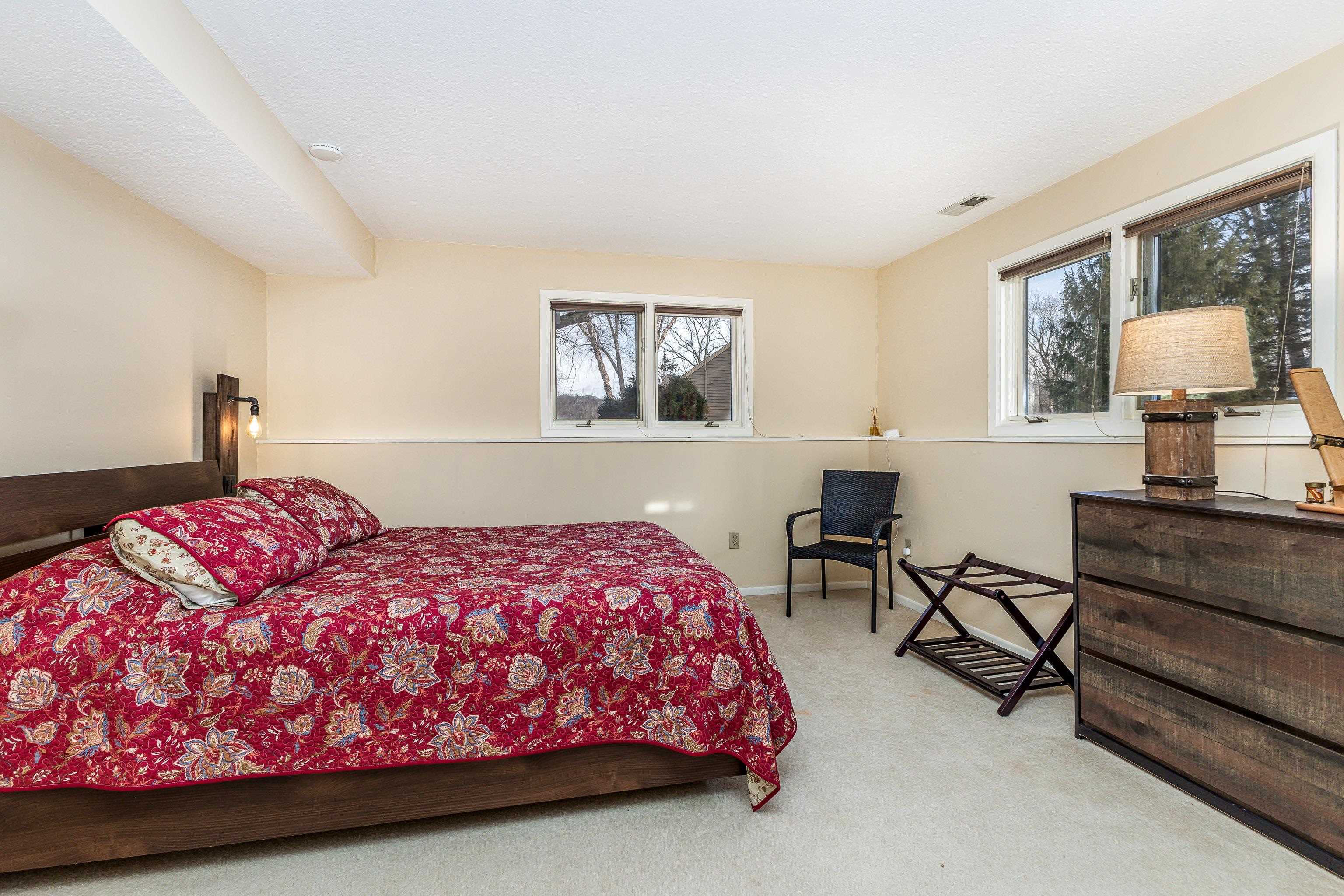 4 Timberline Drive Galena, IL 61036 - Photo 10 of 32 a bedroom with a bed and a window