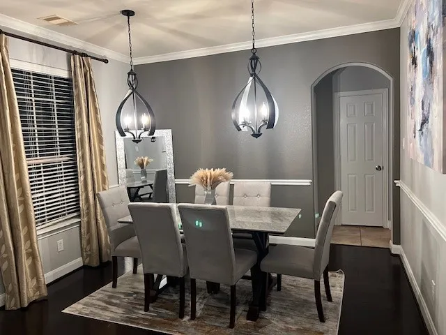 a view of a dining room with furniture