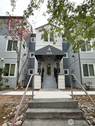 a front view of house with street
