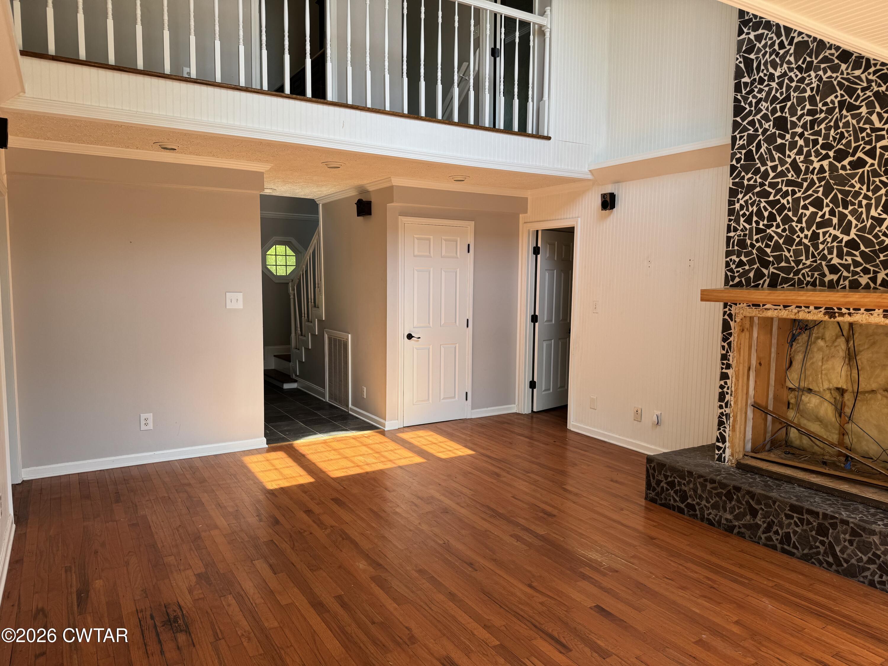 597 Broadway Road North Lexington, TN 38351 - Photo 6 of 15 a view of a room with wooden floor