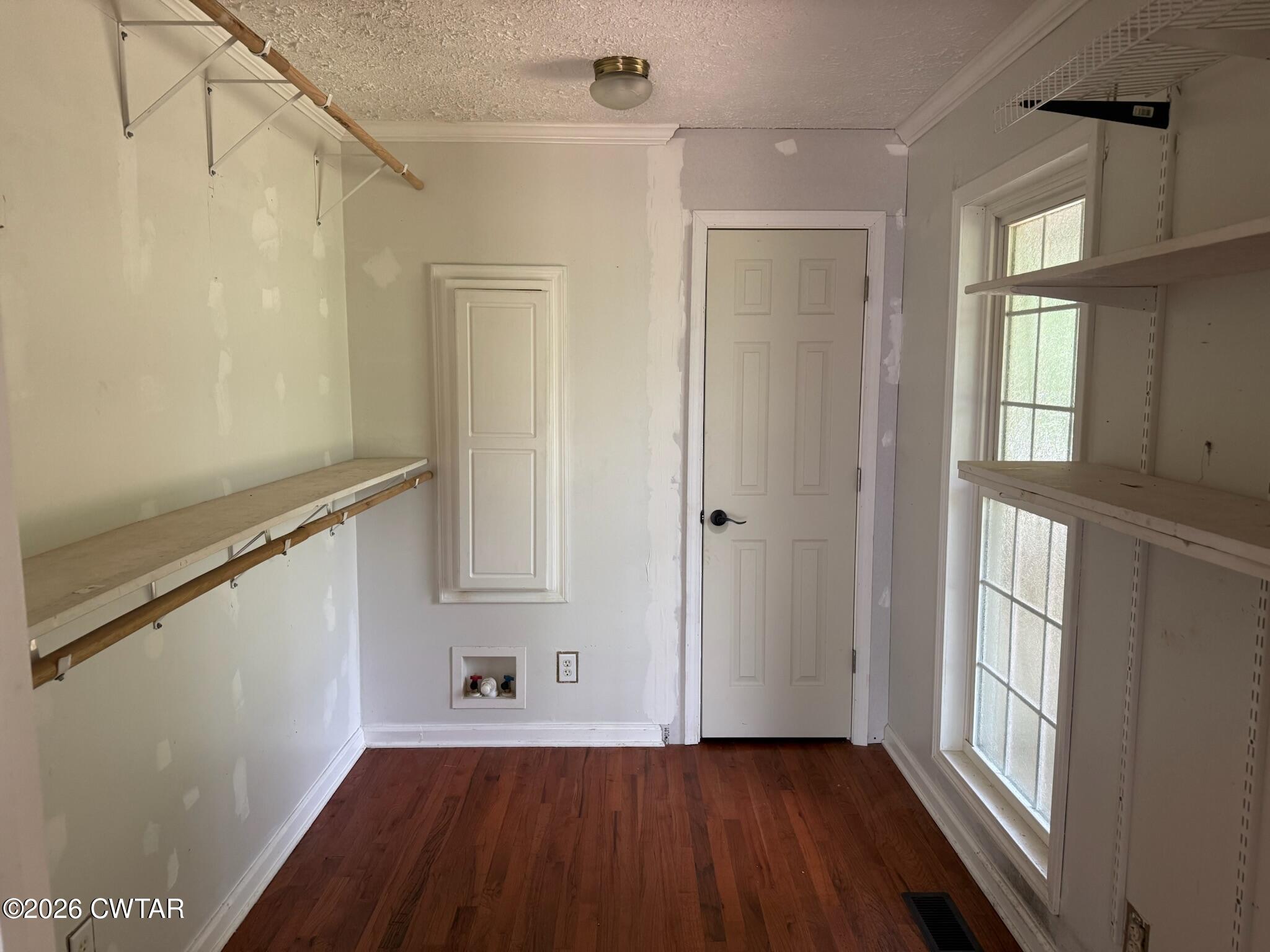 597 Broadway Road North Lexington, TN 38351 - Photo 8 of 15 a view of empty room with wooden floor and fan