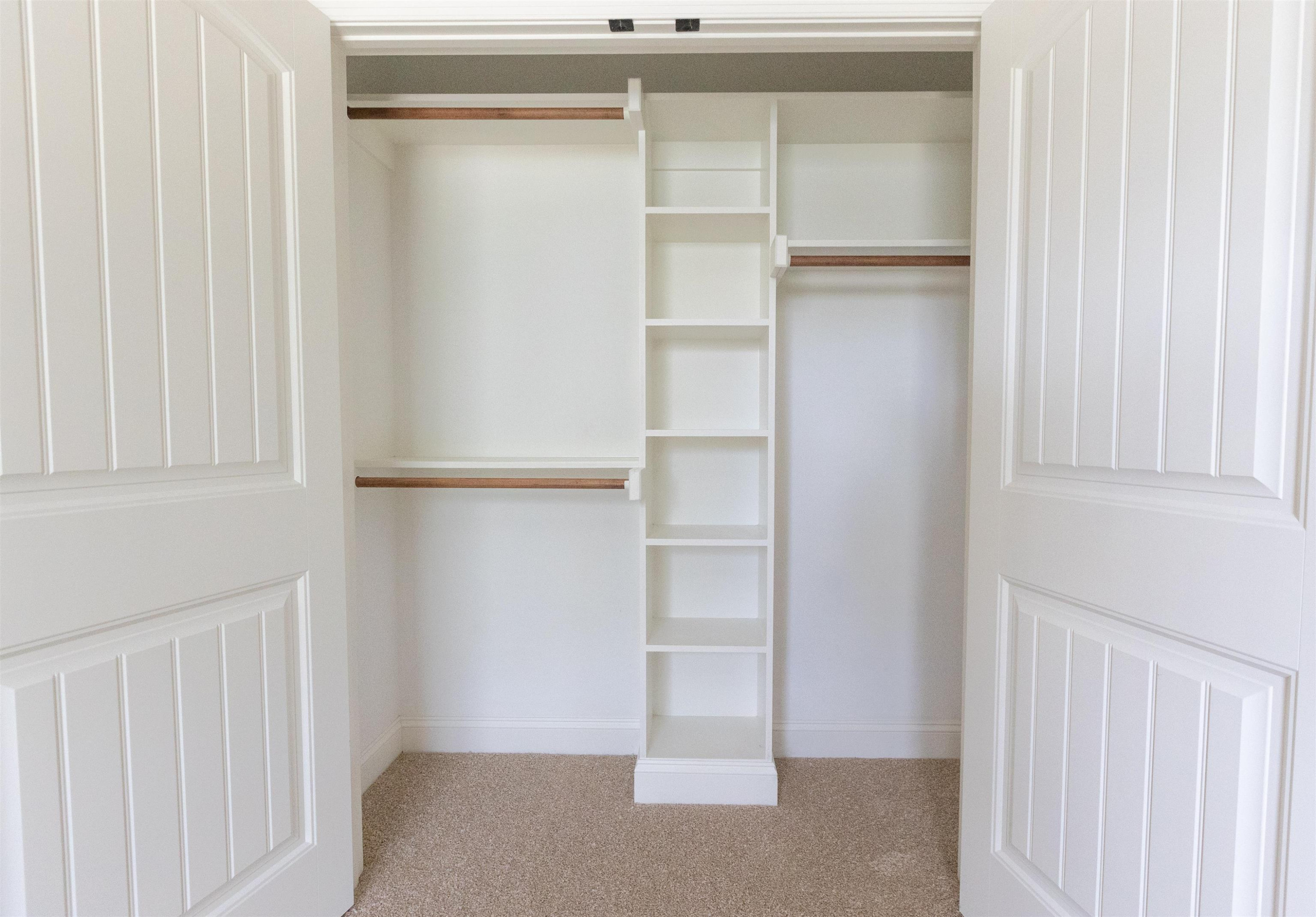 2128 Scarlet Maple Drive Raleigh, NC 27606 - Photo 10 of 17 Both secondary bedrooms boast closets with built in storage. Built in Closet Storage