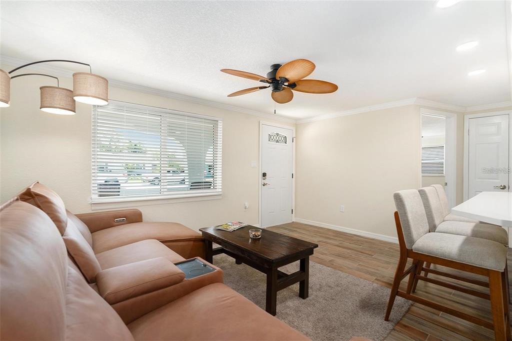 13401 Neptune Drive Hudson, FL 34667 - Photo 3 of 21 a living room with furniture and a window