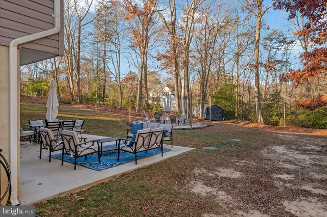 an aerial view of houses with outdoor space