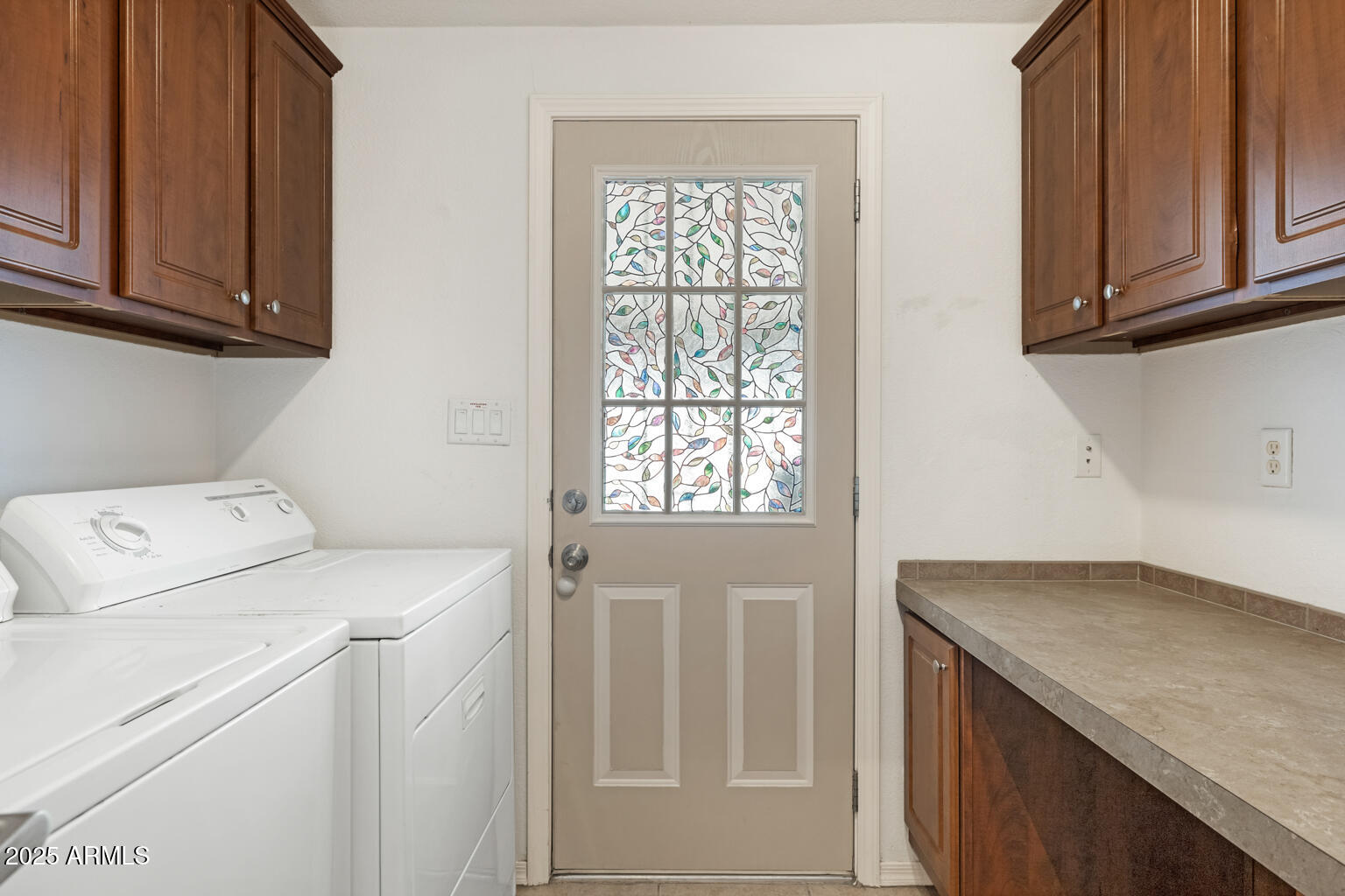 1706 East John Cabot Road Phoenix, AZ 85022 - Photo 12 of 26 a utility room with dryer and washer