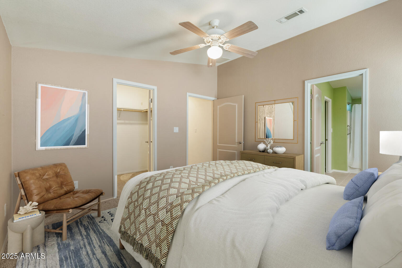 1706 East John Cabot Road Phoenix, AZ 85022 - Photo 14 of 26 a spacious bedroom with a bed and a chair