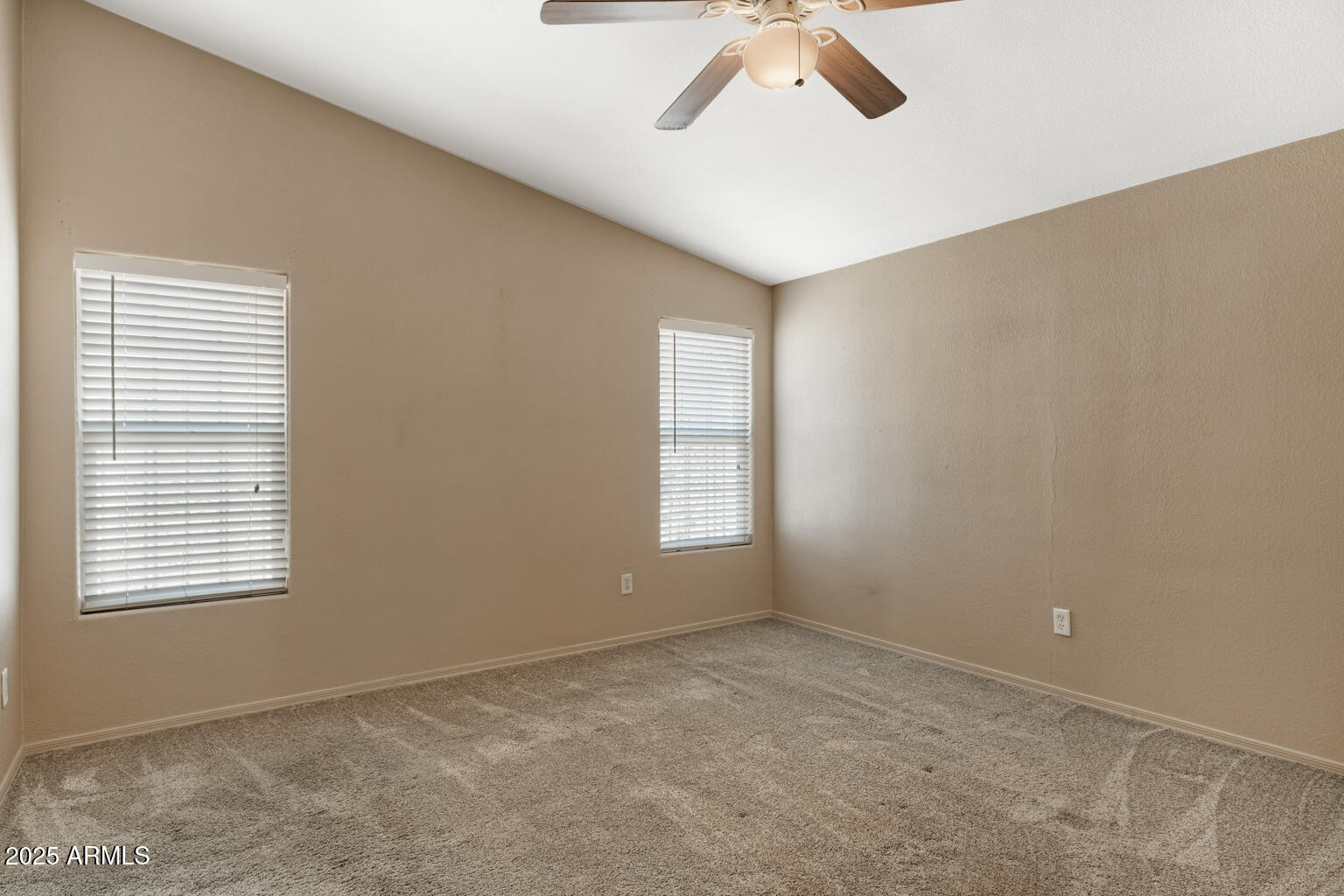 1706 East John Cabot Road Phoenix, AZ 85022 - Photo 17 of 26 a view of an empty room with a window