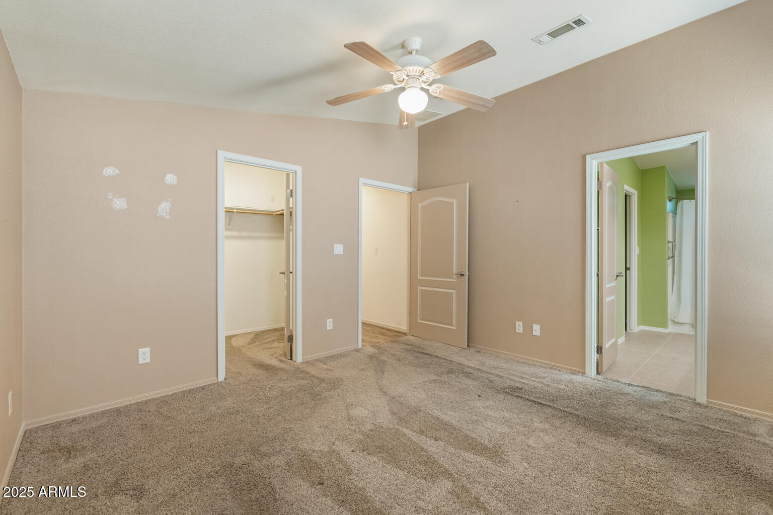 1706 East John Cabot Road Phoenix, AZ 85022 - Photo 19 of 26 an empty room with fan and entrance