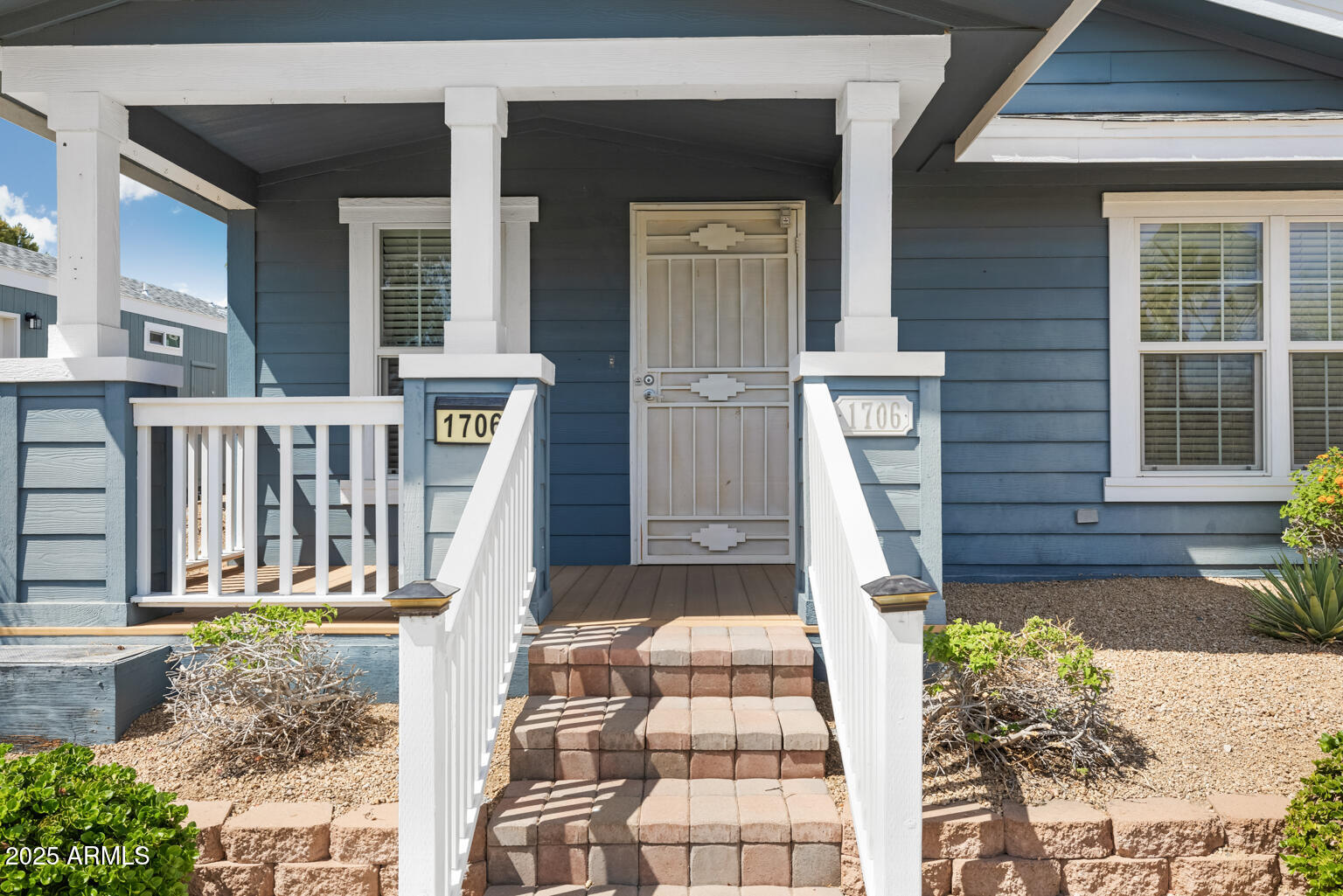1706 East John Cabot Road Phoenix, AZ 85022 - Photo 4 of 26 a front view of a house with a yard