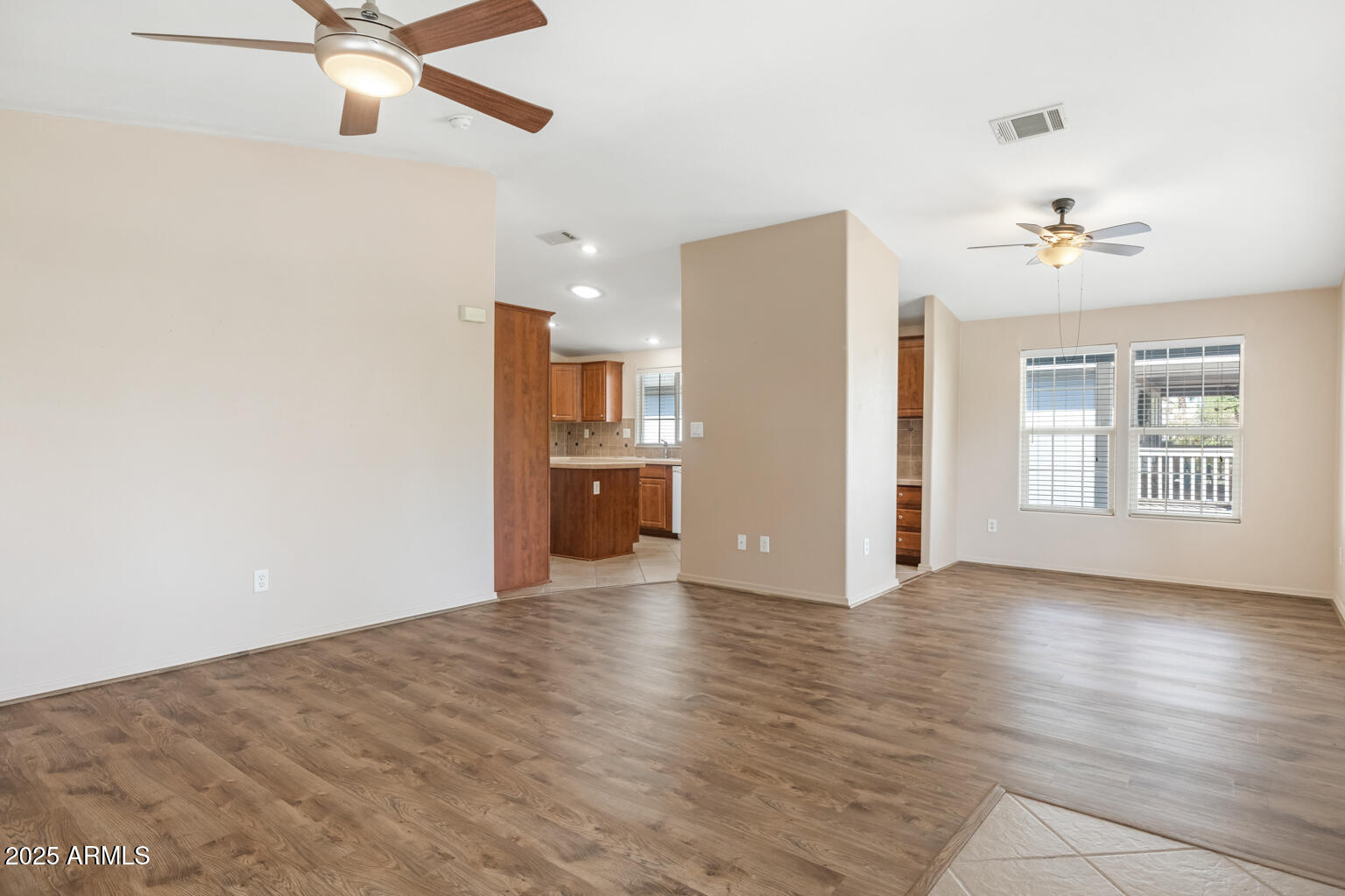 1706 East John Cabot Road Phoenix, AZ 85022 - Photo 7 of 26 a view of an empty room with a window