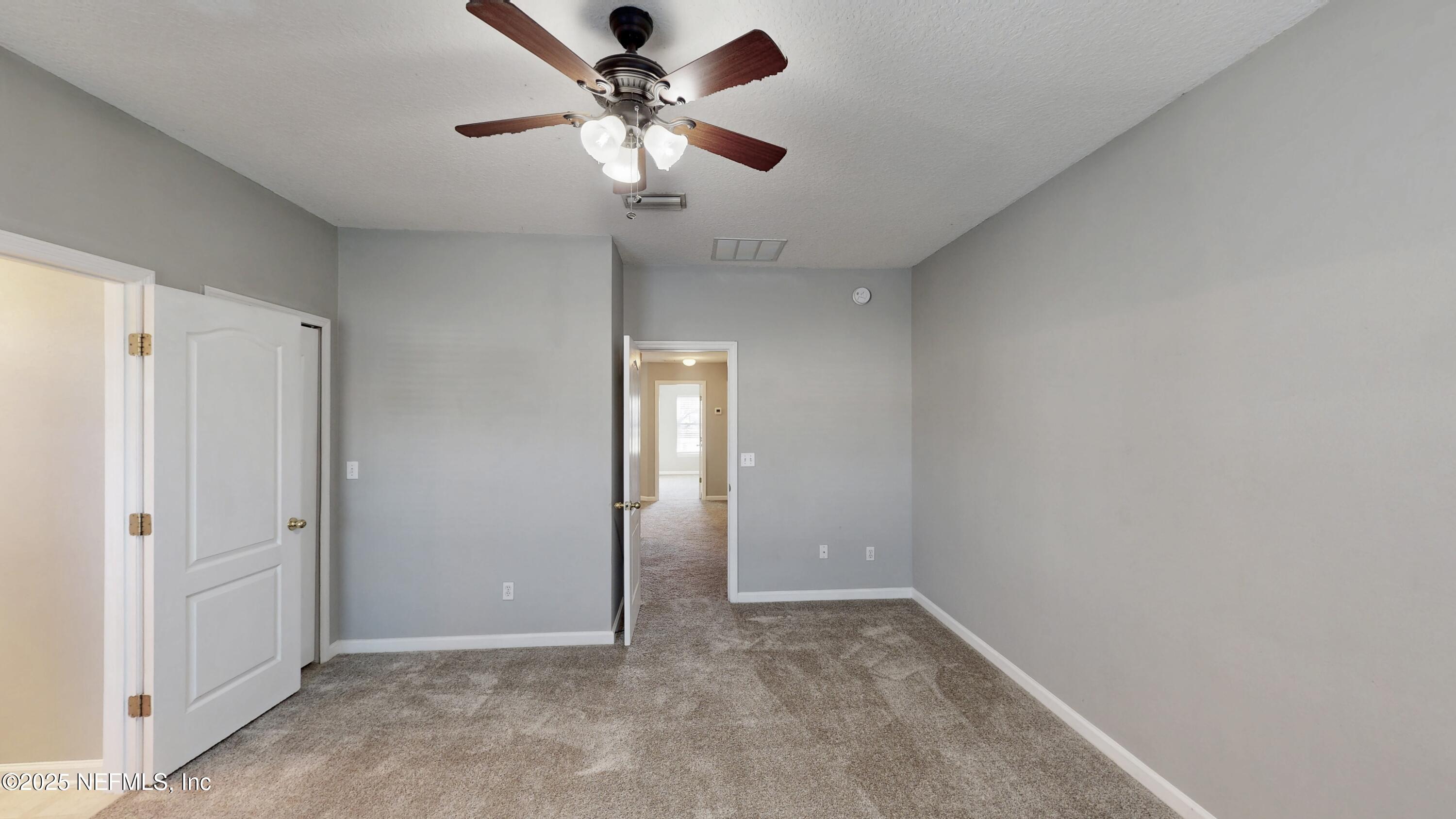 1445 Biscayne Bay Drive Jacksonville, FL 32218 - Photo 9 of 10 wooden floor in an empty room