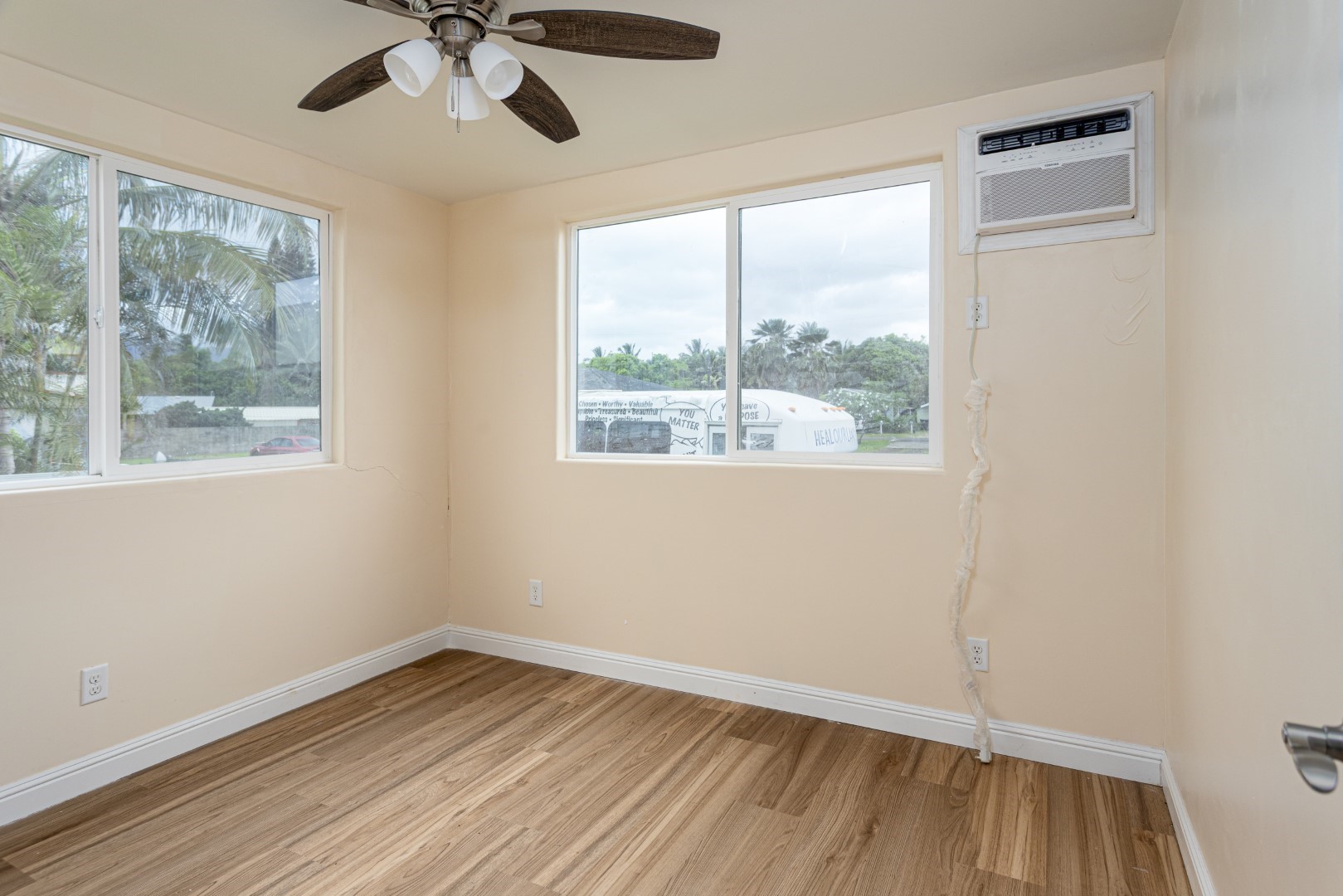 4580 Mamane Street Kapaa, HI 96746 - Photo 21 of 30 a view of empty room with wooden floor and fan