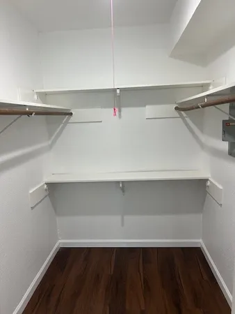 a bathroom with a sink vanity and a mirror