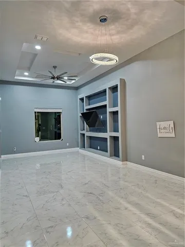 a kitchen with stainless steel appliances granite countertop a stove refrigerator sink and cabinets