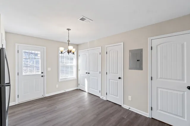 a kitchen with a sink and a window