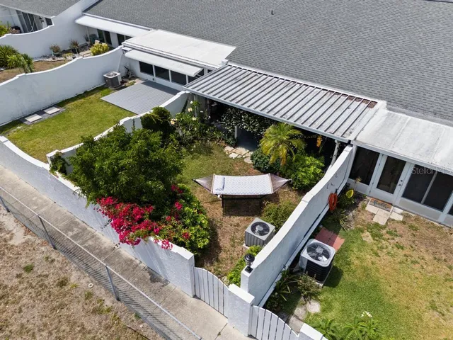 an aerial view of a city with balcony