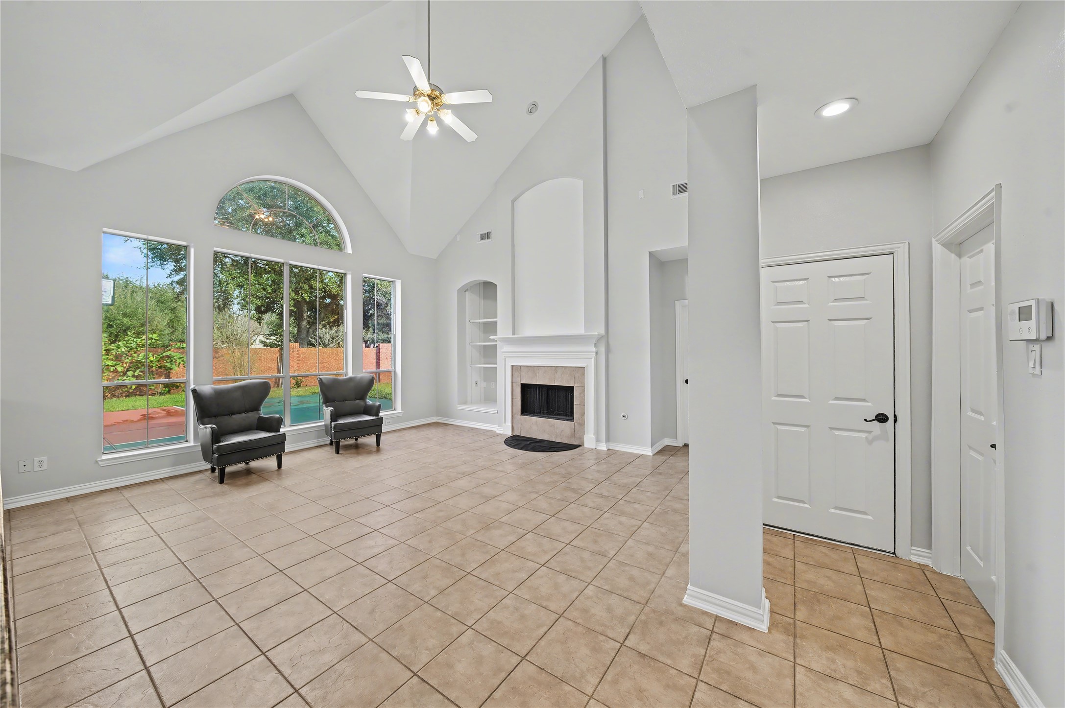 5403 Emerald Pointe Lane Sugar Land, TX 77479 - Photo 21 of 50 a view of a livingroom with furniture and a fireplace