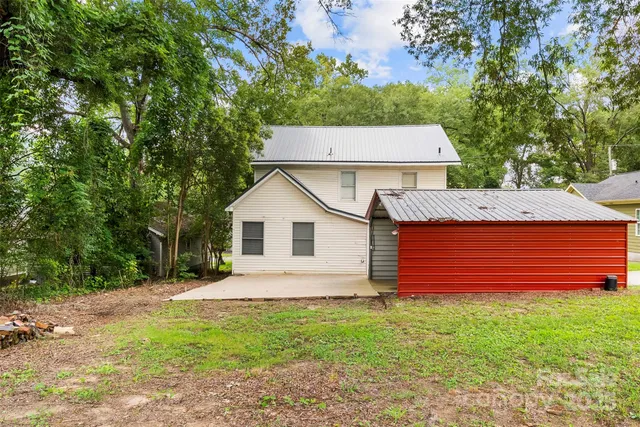 a view of a backyard with a garden