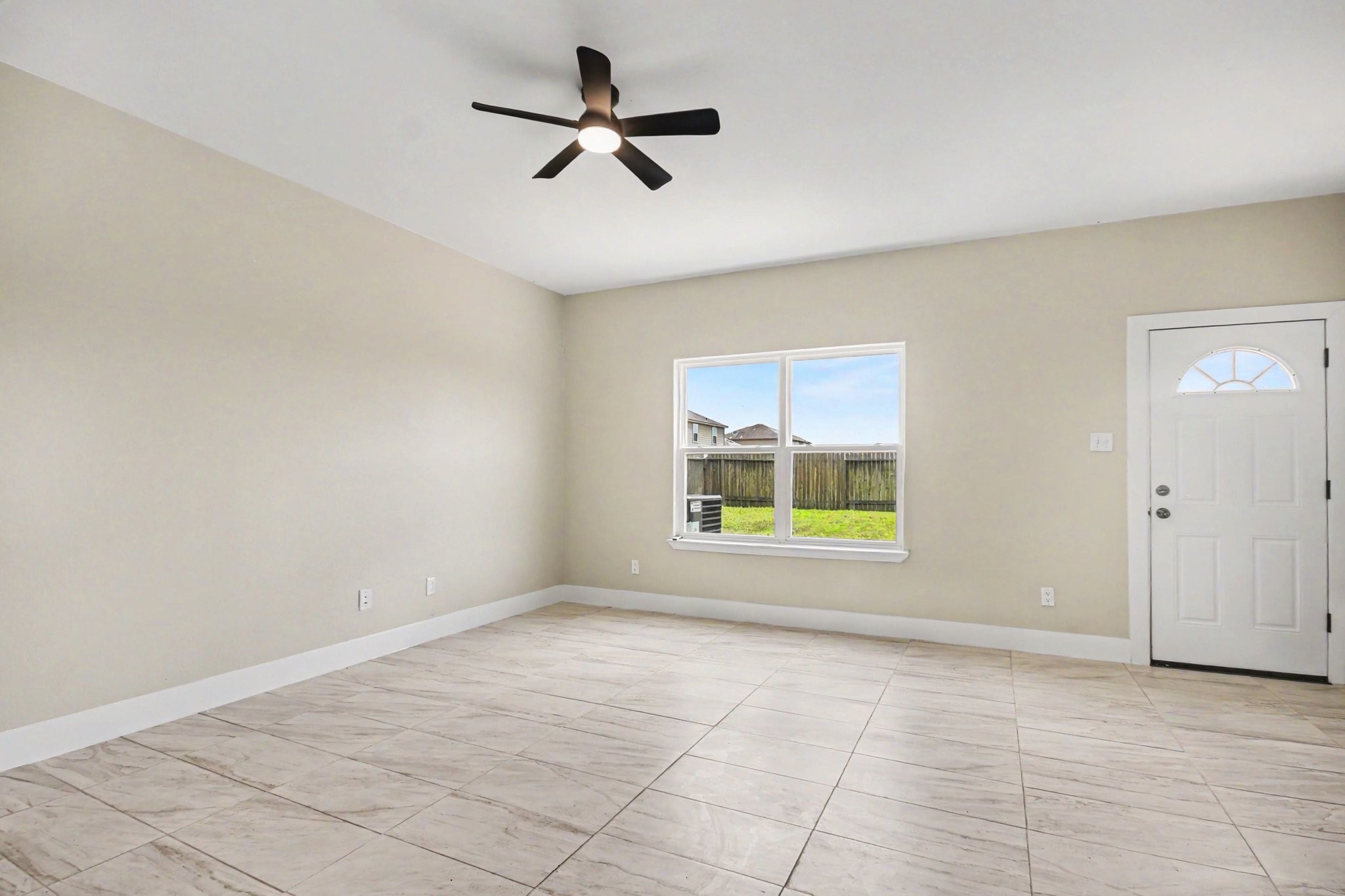 1322 Diamond Drape Drive Rosharon, TX 77583 - Photo 8 of 45 a view of an empty room with a window