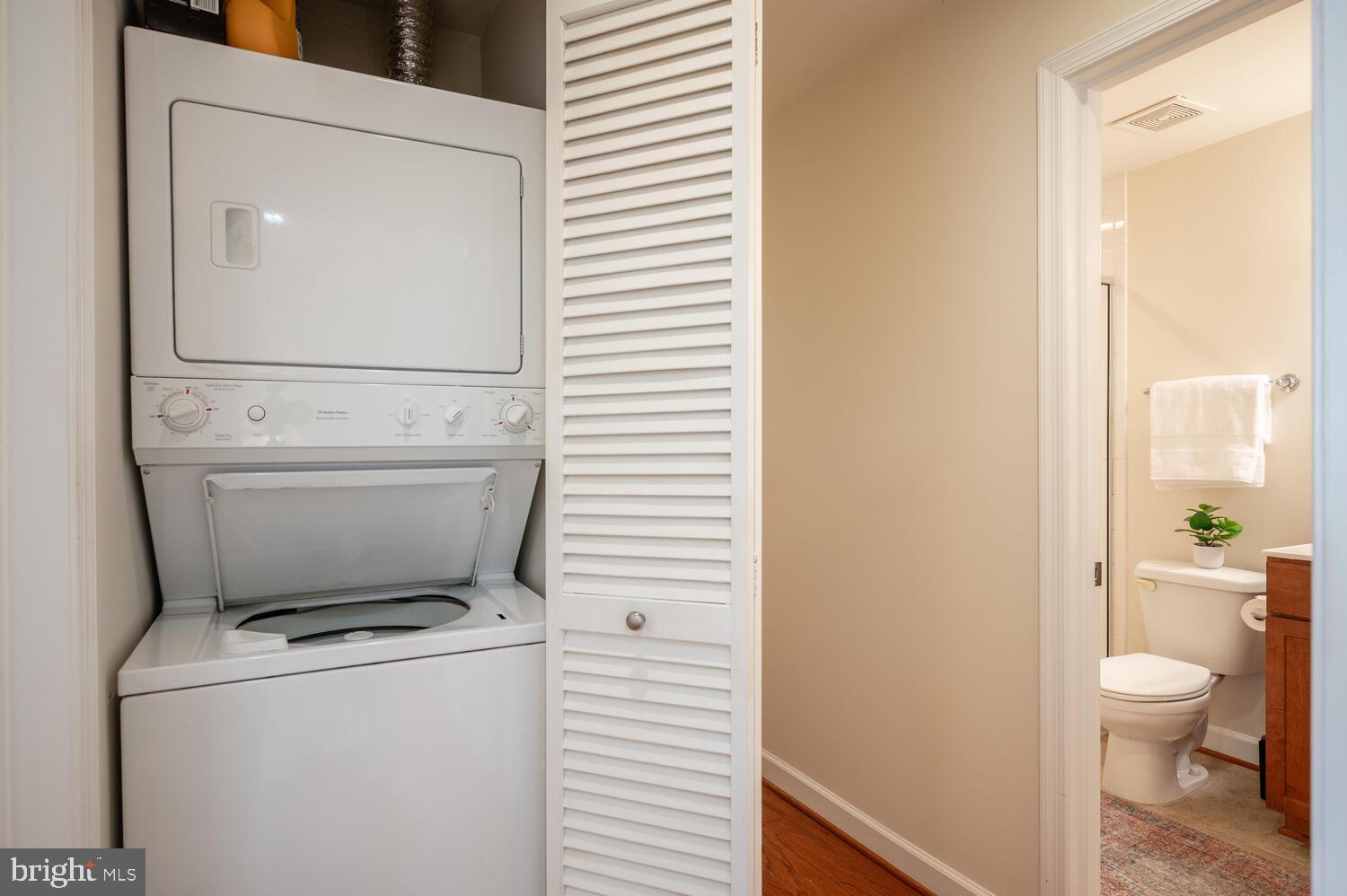 4113 South Four Mile Run Drive, Unit 404 Arlington, VA 22204 - Photo 24 of 39 a bathroom with a toilet and a shower
