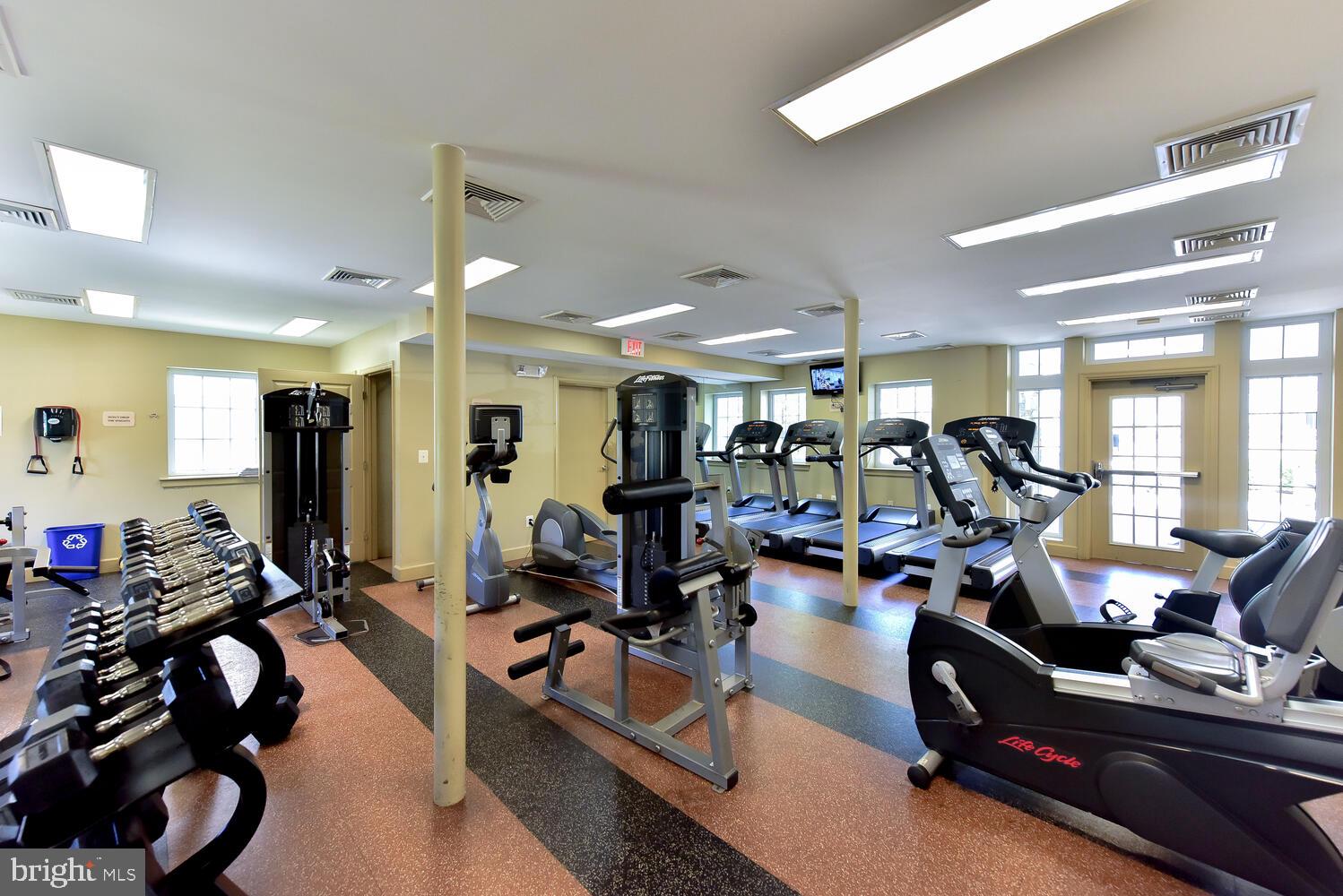 4113 South Four Mile Run Drive, Unit 404 Arlington, VA 22204 - Photo 33 of 39 a view of a room with gym equipment