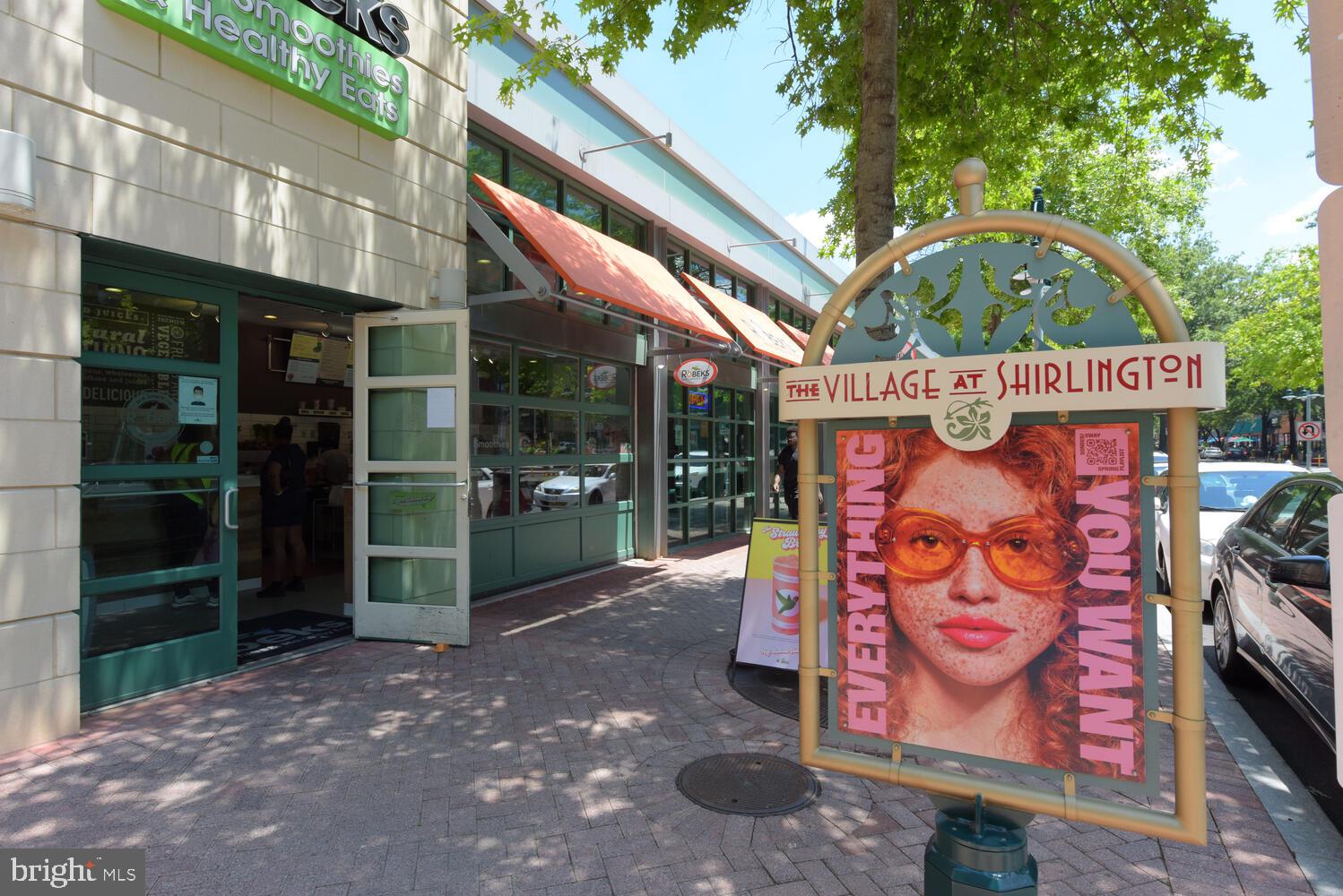 4113 South Four Mile Run Drive, Unit 404 Arlington, VA 22204 - Photo 39 of 39 a view of a street with stores