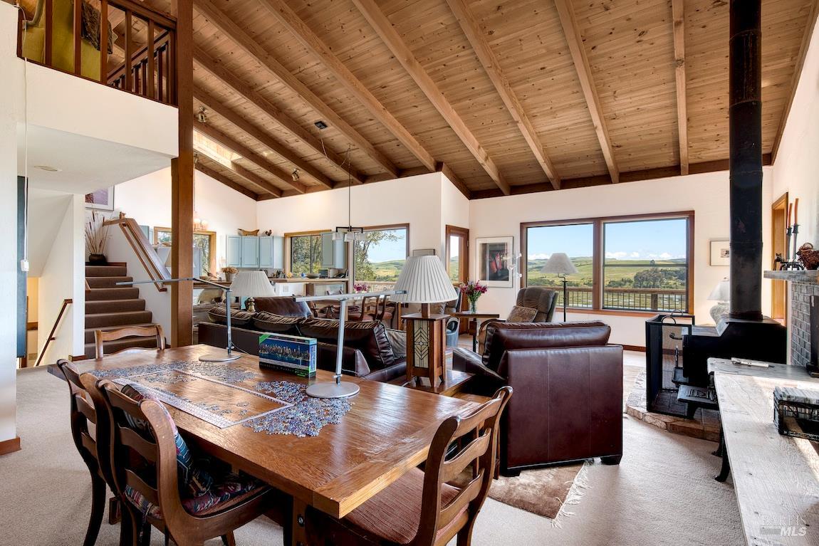 57 Laurel Street Inverness, CA 94956 - Photo 12 of 45 a view of a dining room with furniture window and wooden floor